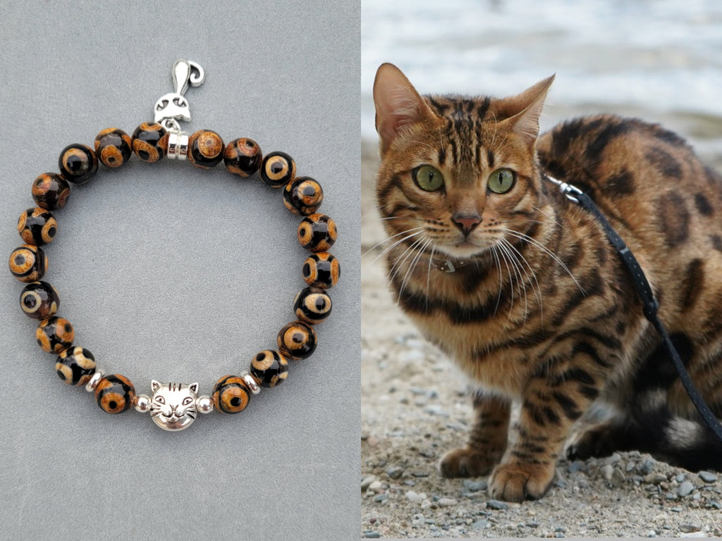 Stylish Gold Tone Cat Bracelet with Sliding Charms